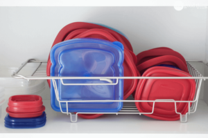 Use a dish drying rack to organise your Tupperware
